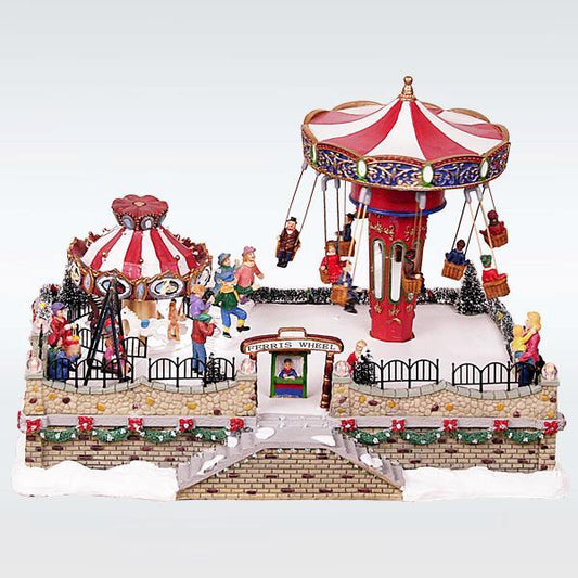 LIGHTED PARK WITH CAROUSSEL AND SWING, WITH MUSIC AND MOVEMENT, WITH TRANSFORMER, 33,5X24X23,5CM